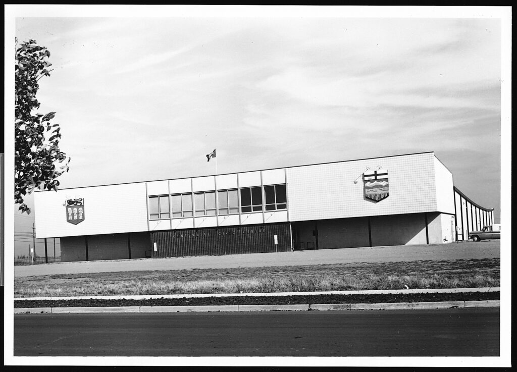 A black and white photo of the Centennial Civic Centre in Lloydminster