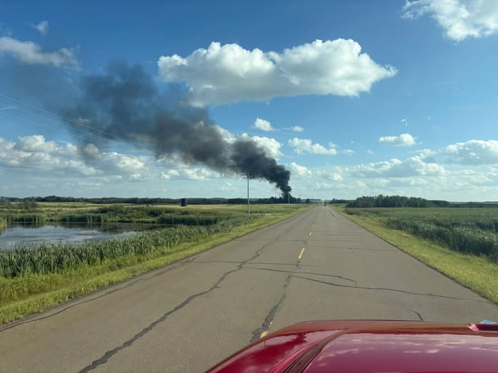 An emergency response vehicle heads to a structure fire outside of Lone Rock, Sask.