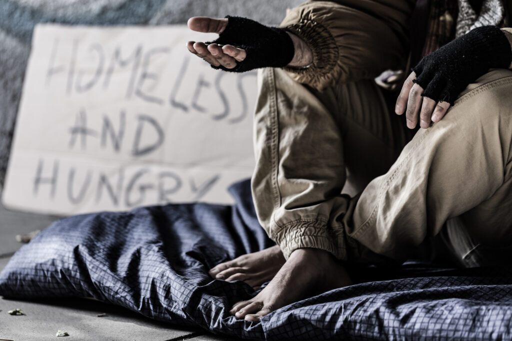 homeless, unhoused person begging