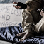 homeless, unhoused person begging