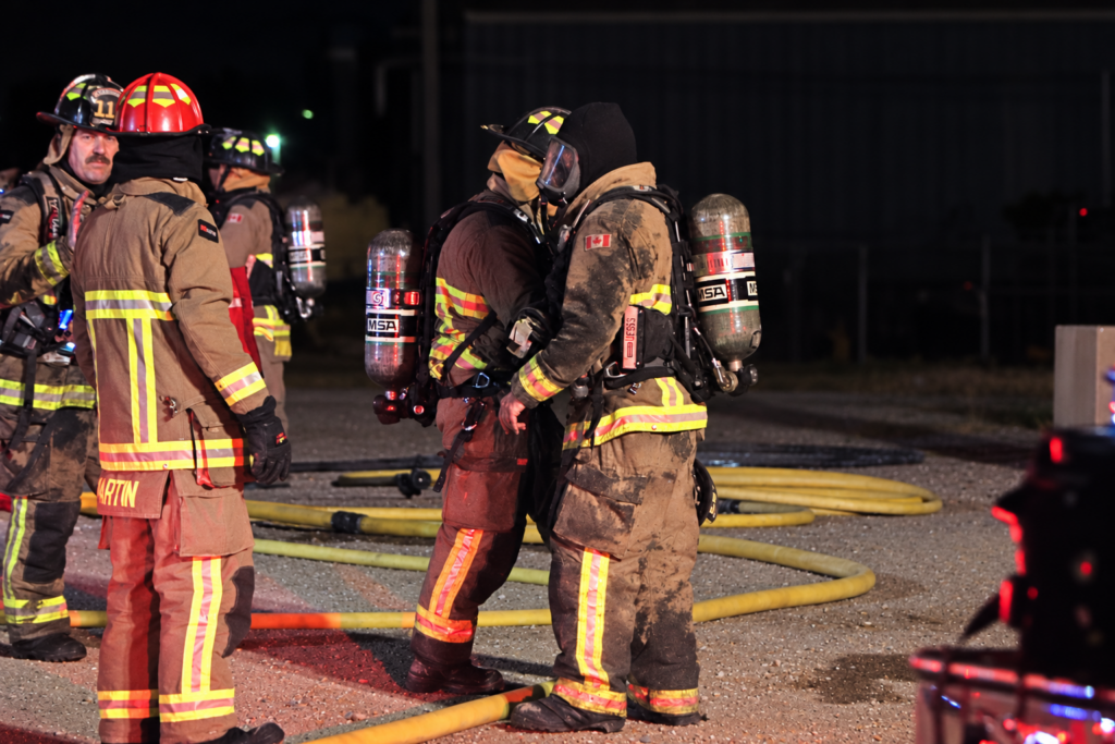 Firefighters Working Under Red Lights 1
