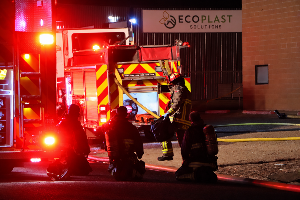 Multiple Lloydminster Firefighters rest after battling a structure fire on 48 St. 